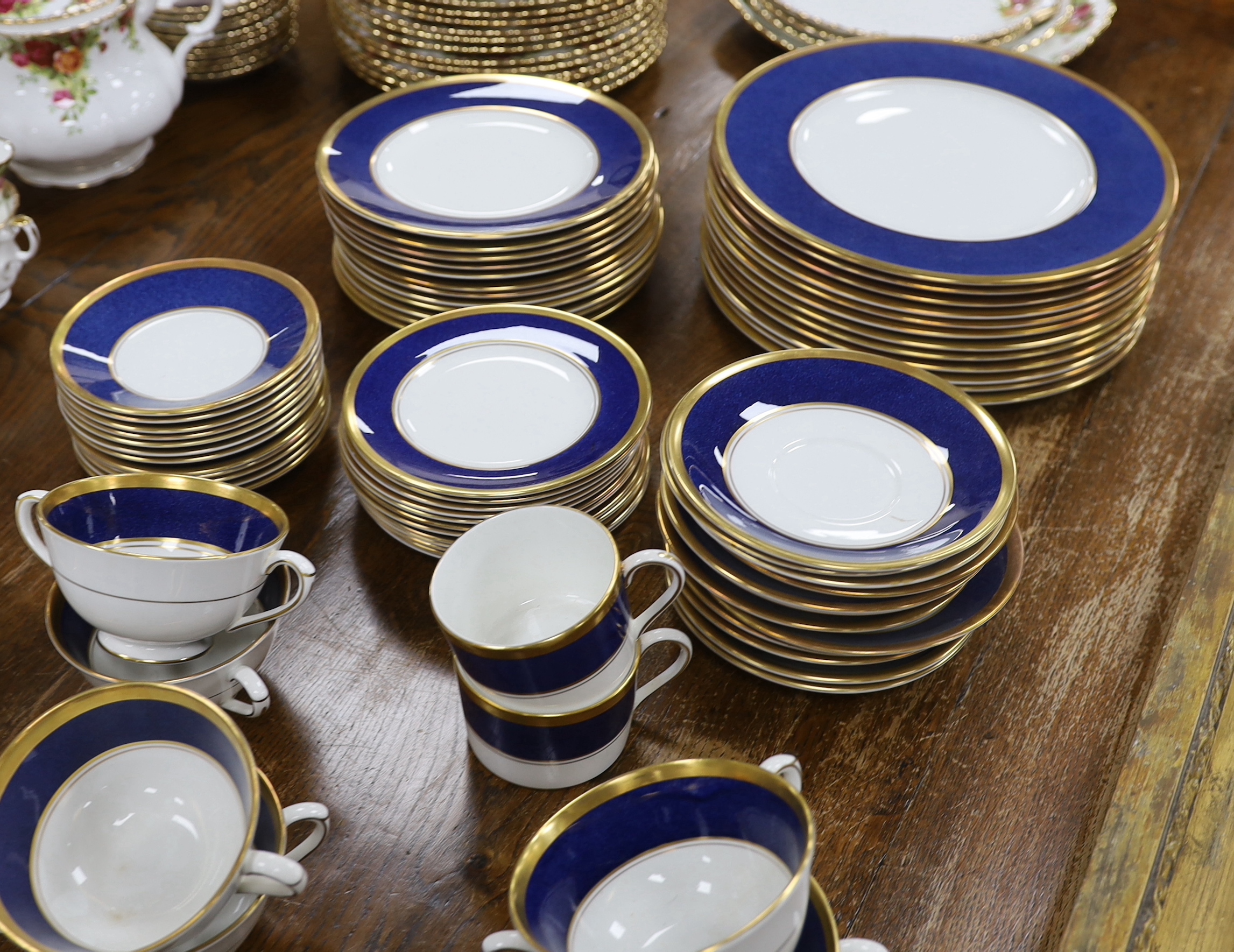 Coalport Athlone Blue dinnerware including cups and saucers, twin handled bowls and plates, largest 27cm in diameter